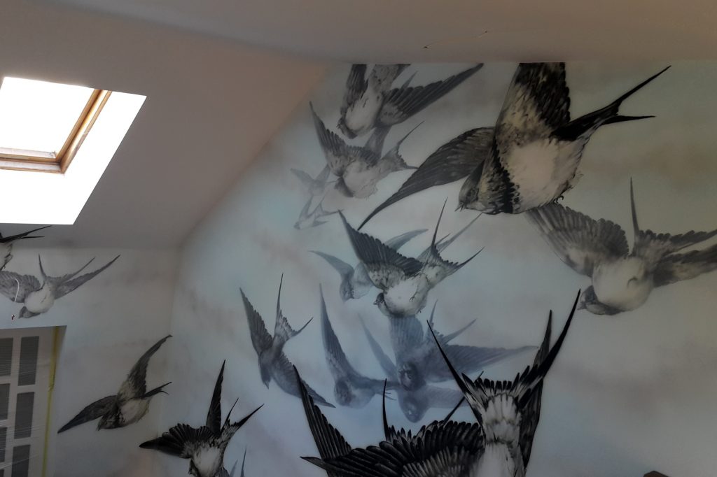Mural na klatce schodowej, malowanie obrazu na klatce schodowej
