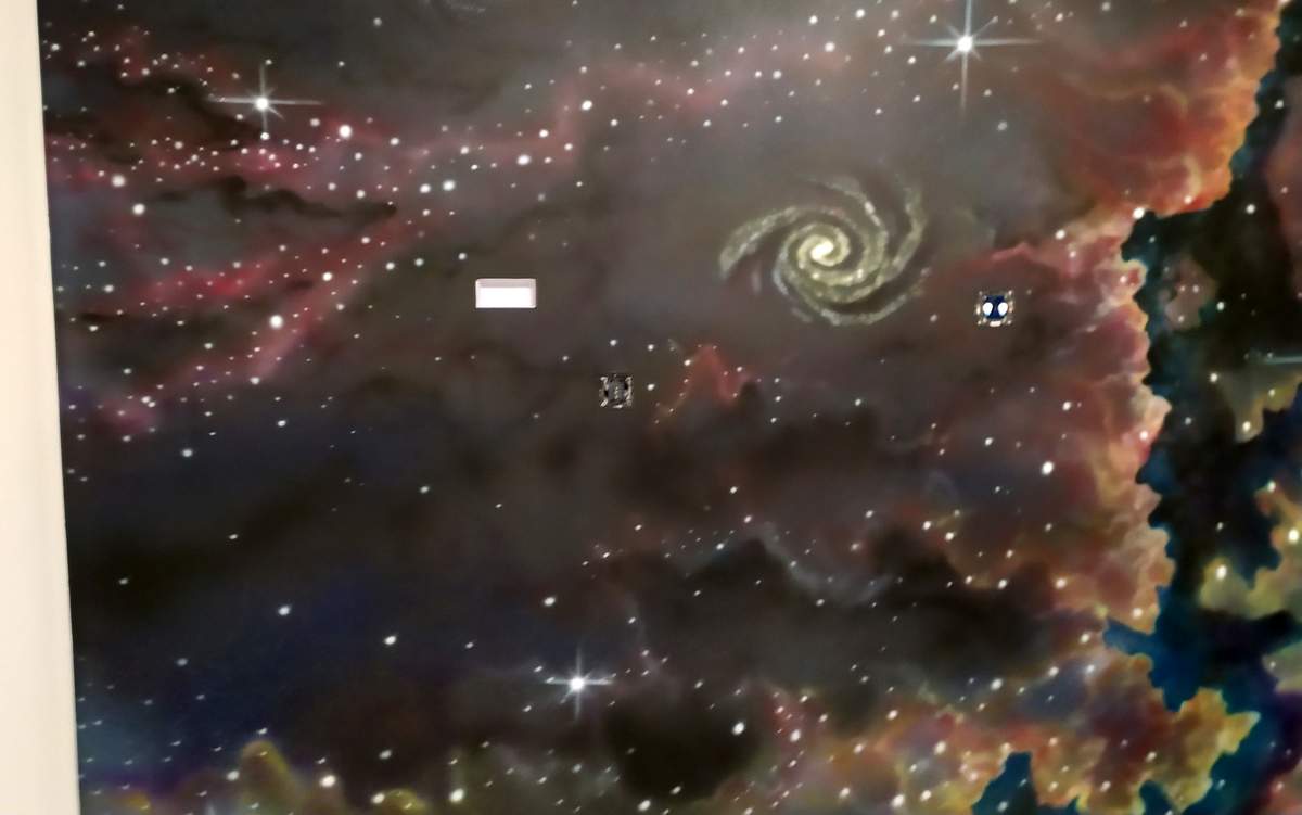 Artystyczne malowanie ściany, mural 3D, malowanie kosmosu na ścianie