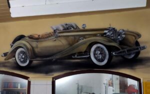 Mural w warsztacie samochodowym, malowanie samochodu na ścianie