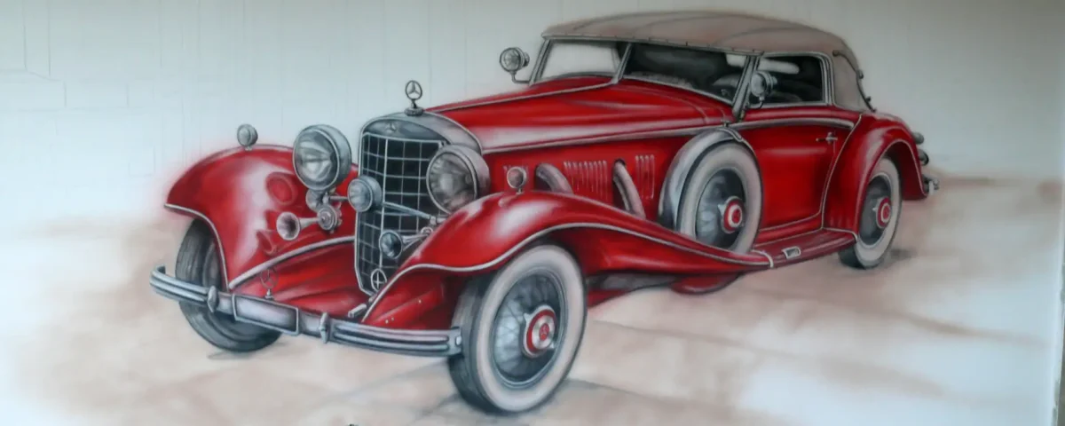 Mural - czerwony samochód retro namalowany na ścianie