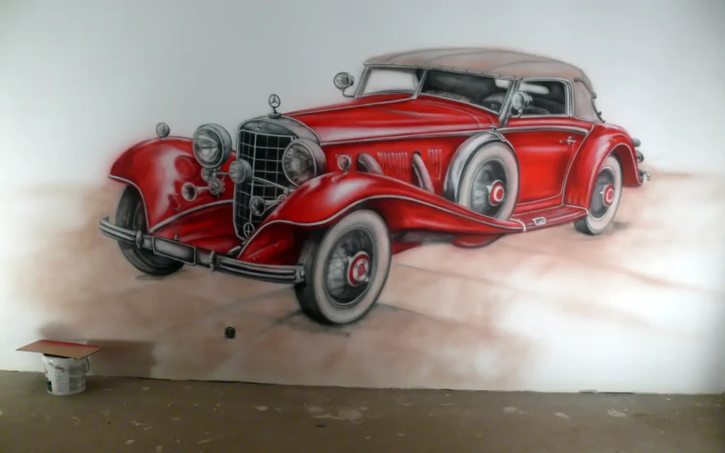 Mural - czerwony samochód retro namalowany na ścianie