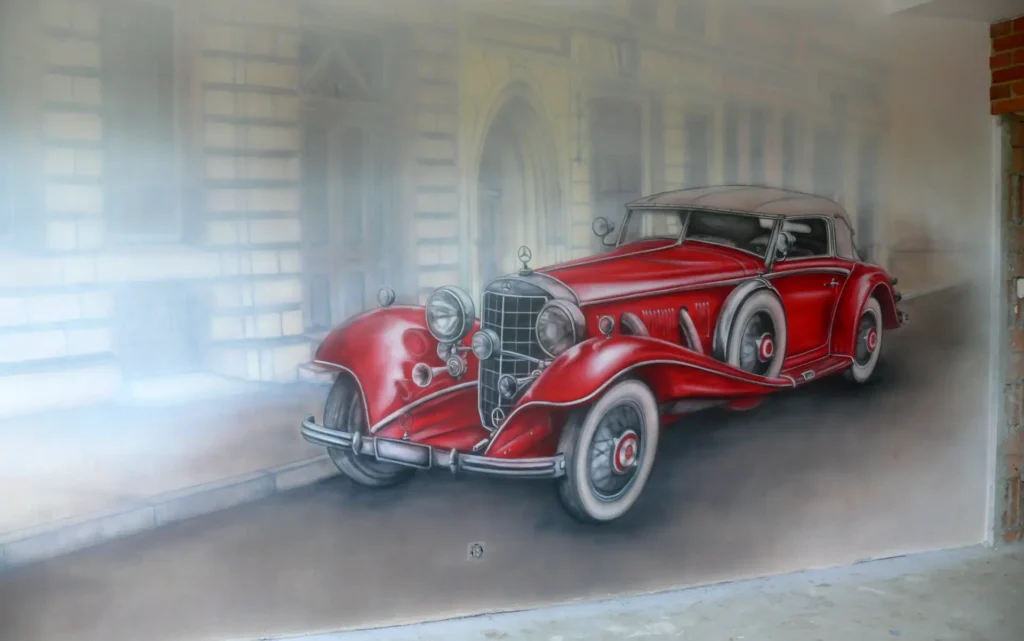 Mural - czerwony samochód retro namalowany na ścianie